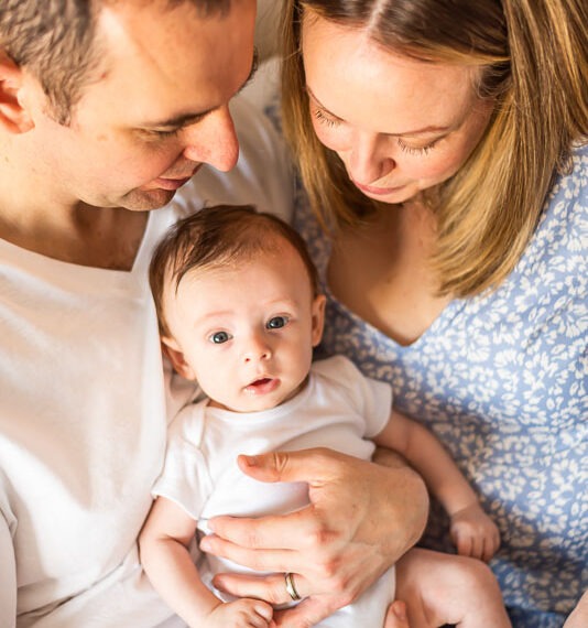 Parents with newborn baby.